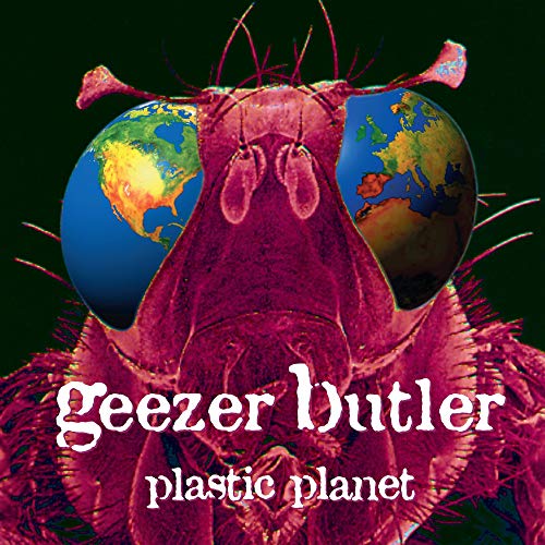 "Album cover with a giant insect and globe reflected in its eyes."