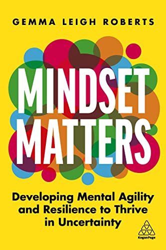 Book cover with bold red text “MINDSET MATTERS” over colorful overlapping circles.