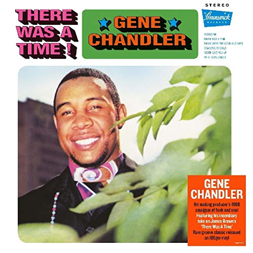 Gene Chandler album cover, portrait of a smiling man with green foliage.