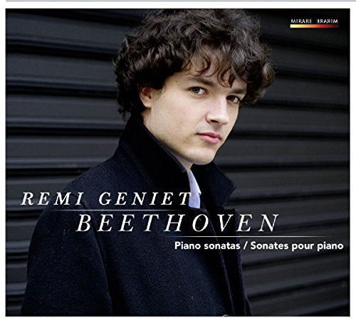 CD cover featuring pianist Remi Geniet in a black coat.