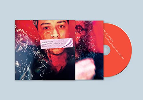 CD case with a close-up portrait and abstract red imagery.