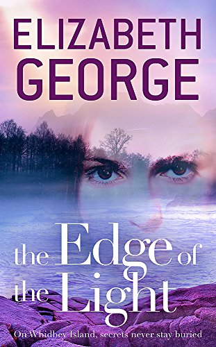Book cover: woman’s eyes over a misty landscape, purple and blue tones.