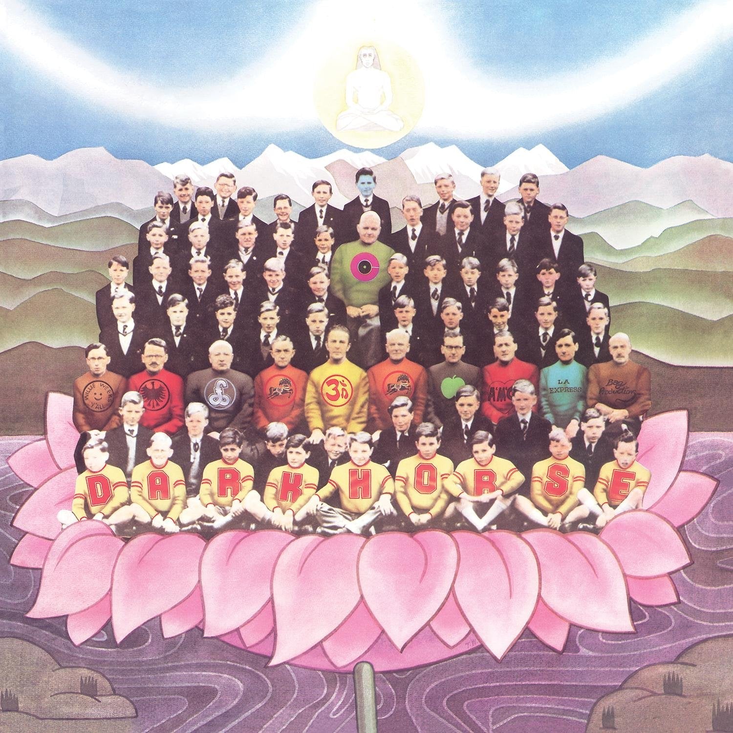 A large group of men in suits posing on a giant pink lotus flower.