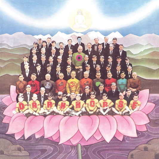 A large group of men in suits posing on a giant pink lotus flower.