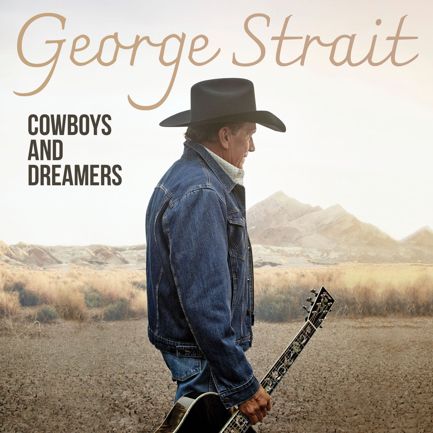 George Strait album cover: cowboy with guitar against a desert backdrop.