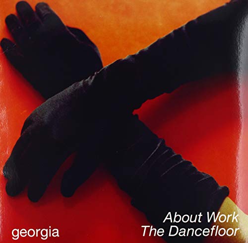 Record cover featuring black gloves against a bright orange background.