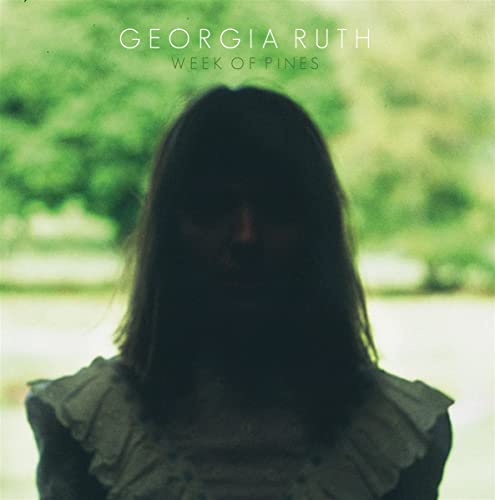 Album cover for Georgia Ruth’s “Week Of Pines” featuring a woman’s back.
