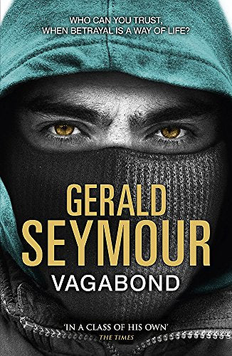 Book cover: hooded figure with intense yellow eyes, title "Vagabond".
