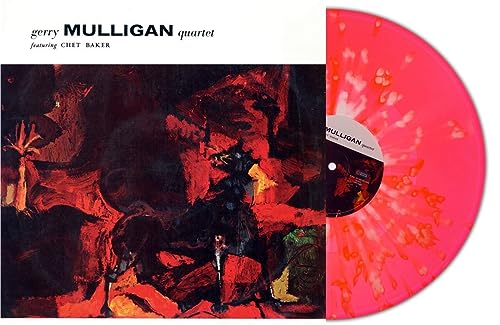 Album cover with abstract red art next to a red and white splatter vinyl.