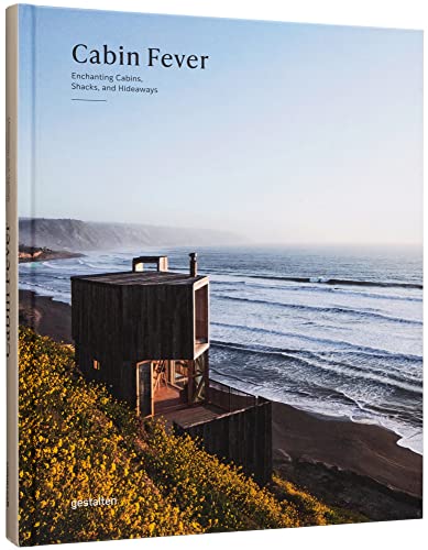 Book cover featuring a modern, dark cabin overlooking a coastal landscape.
