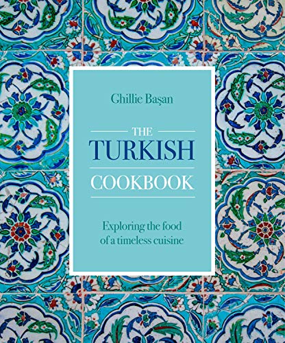 Cookbook cover with turquoise floral tile background and white text.