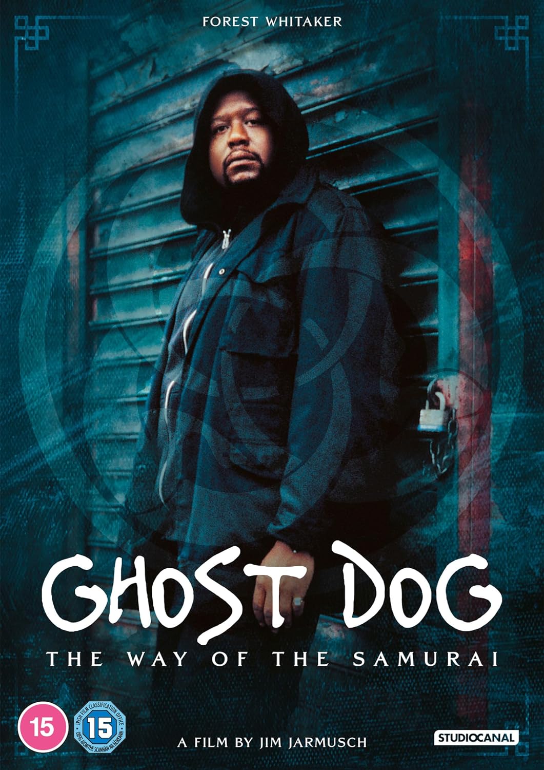 Forest Whitaker in a hooded jacket stands before a dark, textured background.