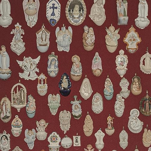 Arrangement of many small, ornate religious figurines on a red background.