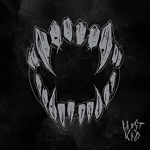 Black and white illustration of a menacing, tooth-filled maw.