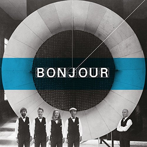 CD cover with a large circular design and four formally dressed people.