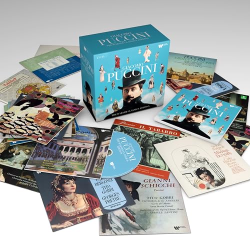 Puccini CD box set with multiple opera covers and discs scattered around.