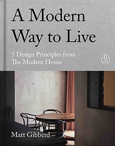Book cover with minimalist interior scene, table and chairs visible.