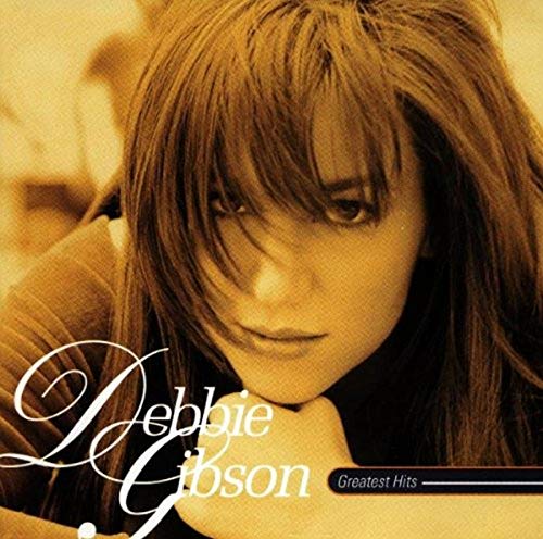 Debbie Gibson’s “Greatest Hits” CD cover featuring a portrait of the singer.