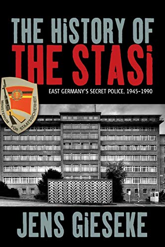 Book cover: "The History of the Stasi" with building and emblem.