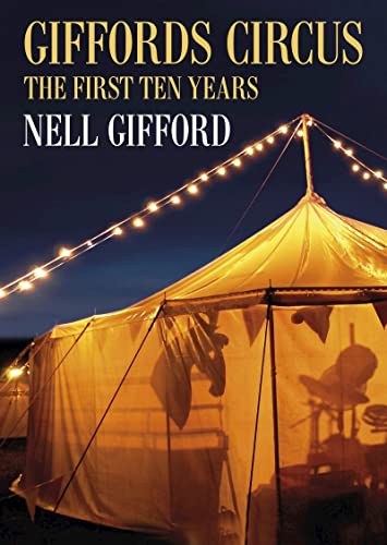 Book cover featuring a warmly lit circus tent with string lights.