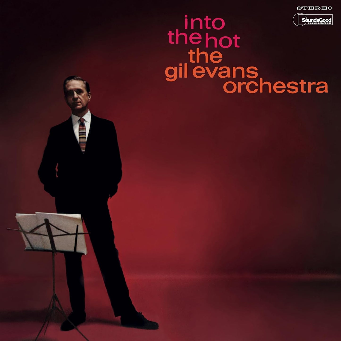 Album cover for Gil Evans’ “Into The Hot” featuring a portrait and sheet music.
