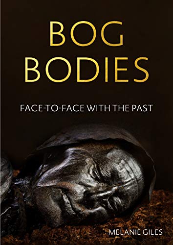 Book cover: “Bog Bodies” featuring a preserved human face in dark peat.