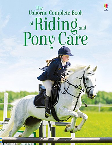 Book cover depicting a young rider on a jumping white horse.