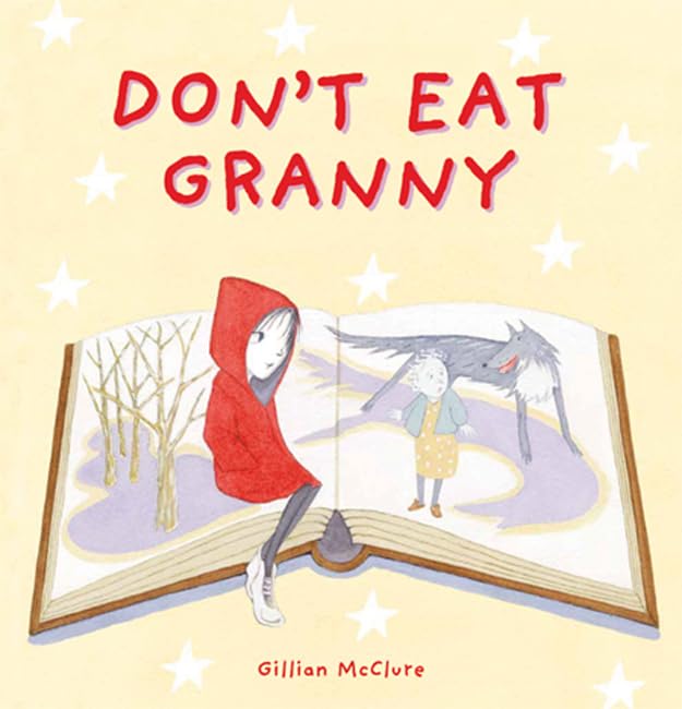 Book cover showing a girl in a red hood sitting on an open book.