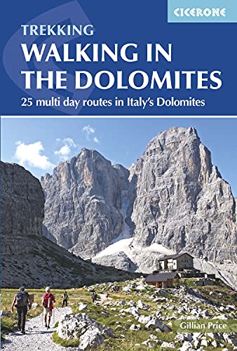 Book cover showing hikers on a trail with rocky mountains and a mountain hut.