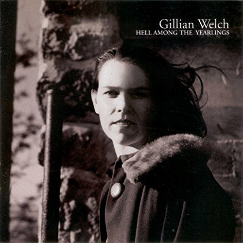 Black and white portrait of Gillian Welch with a fur collar.