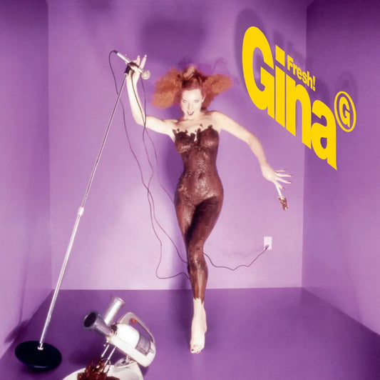 CD cover for Gina G’s “Fresh!” featuring a dynamic, chocolate-covered singer.