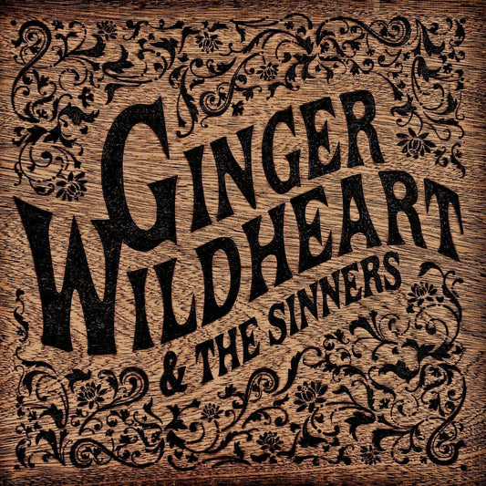 "CD cover with 'Ginger Wildheart & The Sinners' in black on a wooden background."