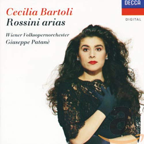 CD cover featuring Cecilia Bartoli with dark curly hair and lace clothing.