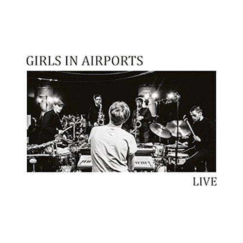 Black and white album cover of Girls in Airports performing live.