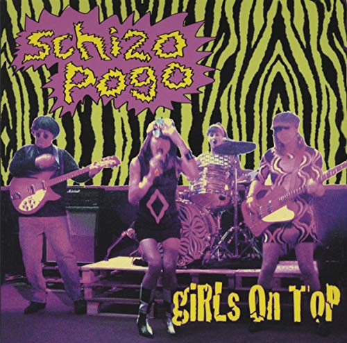 "Album cover featuring a band performing on stage with zebra print background and text."