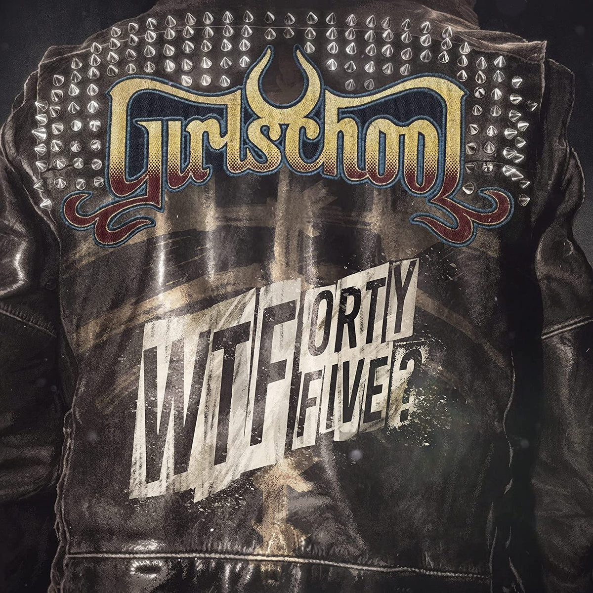 Black leather jacket with "Girlschool" logo and "WTFortyfive?" text.