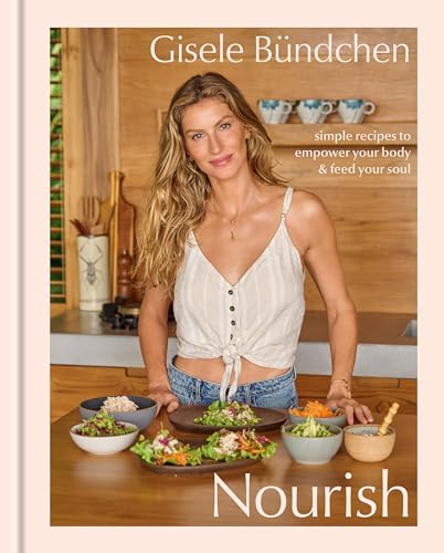 Cookbook cover featuring Gisele Bündchen with healthy food on a table.