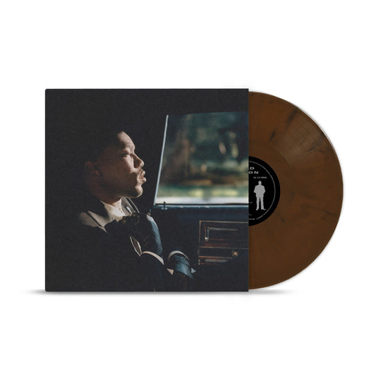 Giveon's "Beloved: Act II" vinyl record with brown marbled disc and cover art.