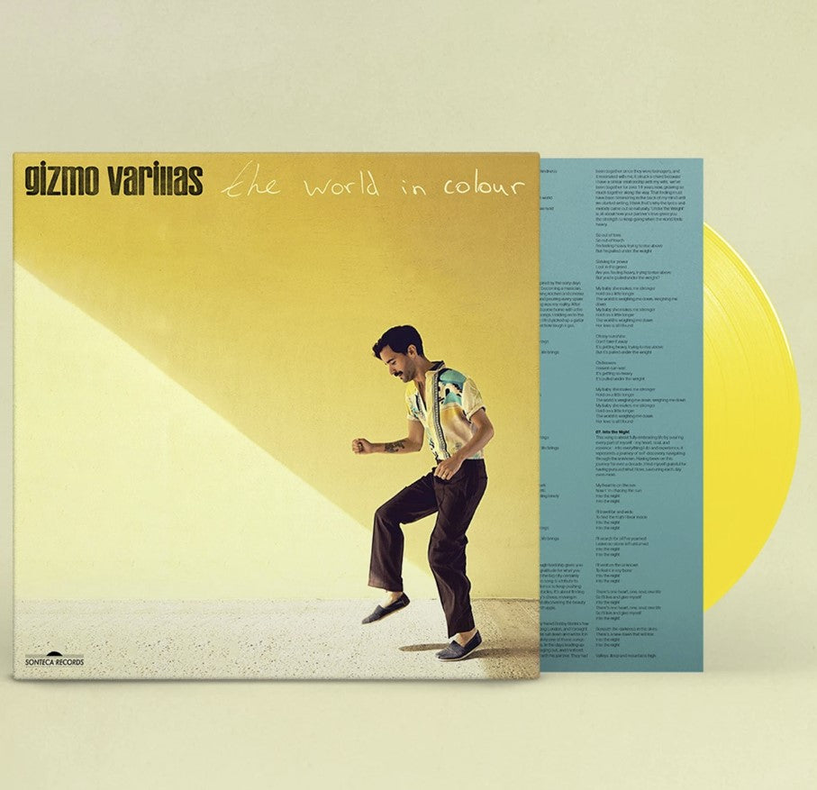 Yellow vinyl LP of "The World In Colour" by Gizmo Varillas, with cover art.