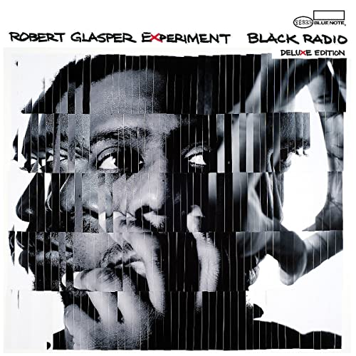 Black and white album cover for Robert Glasper’s “Black Radio” with fragmented portrait.