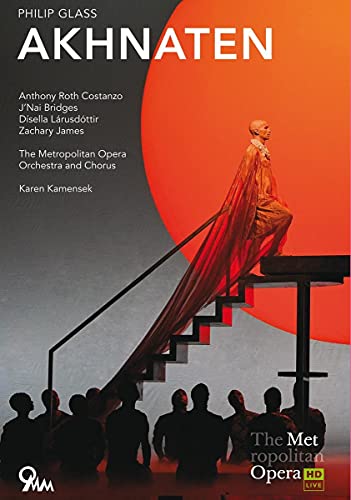 DVD cover for Philip Glass’s “Akhnaten” opera, featuring a figure on stairs.