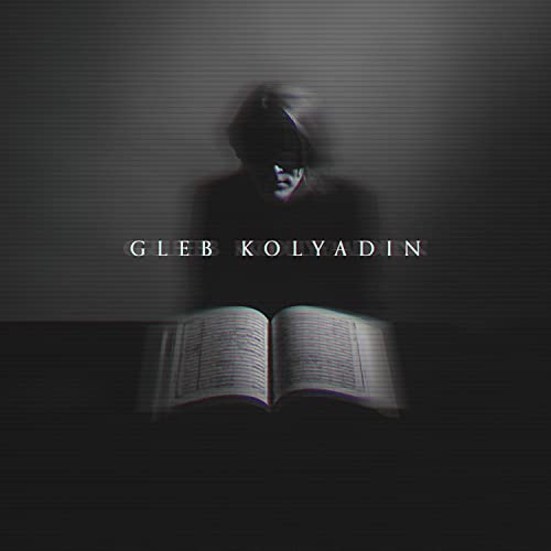 Dark album cover featuring a person over an open book with text.