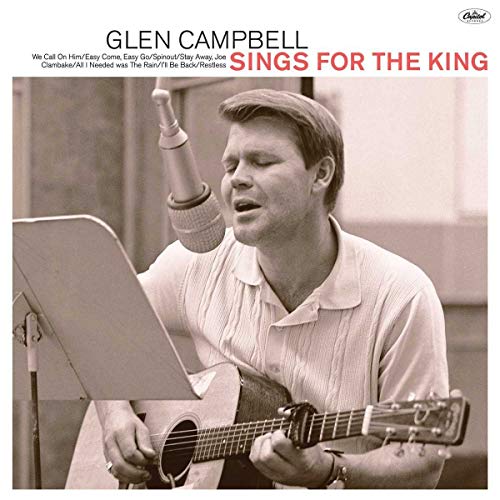 Glen Campbell album cover, singing into a microphone with guitar.