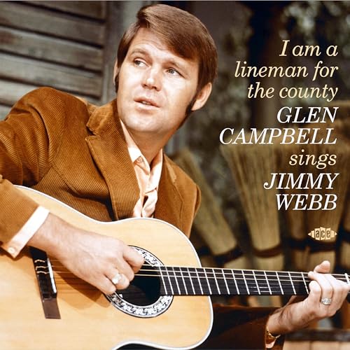 Glen Campbell in a brown corduroy jacket playing an acoustic guitar, album cover art.