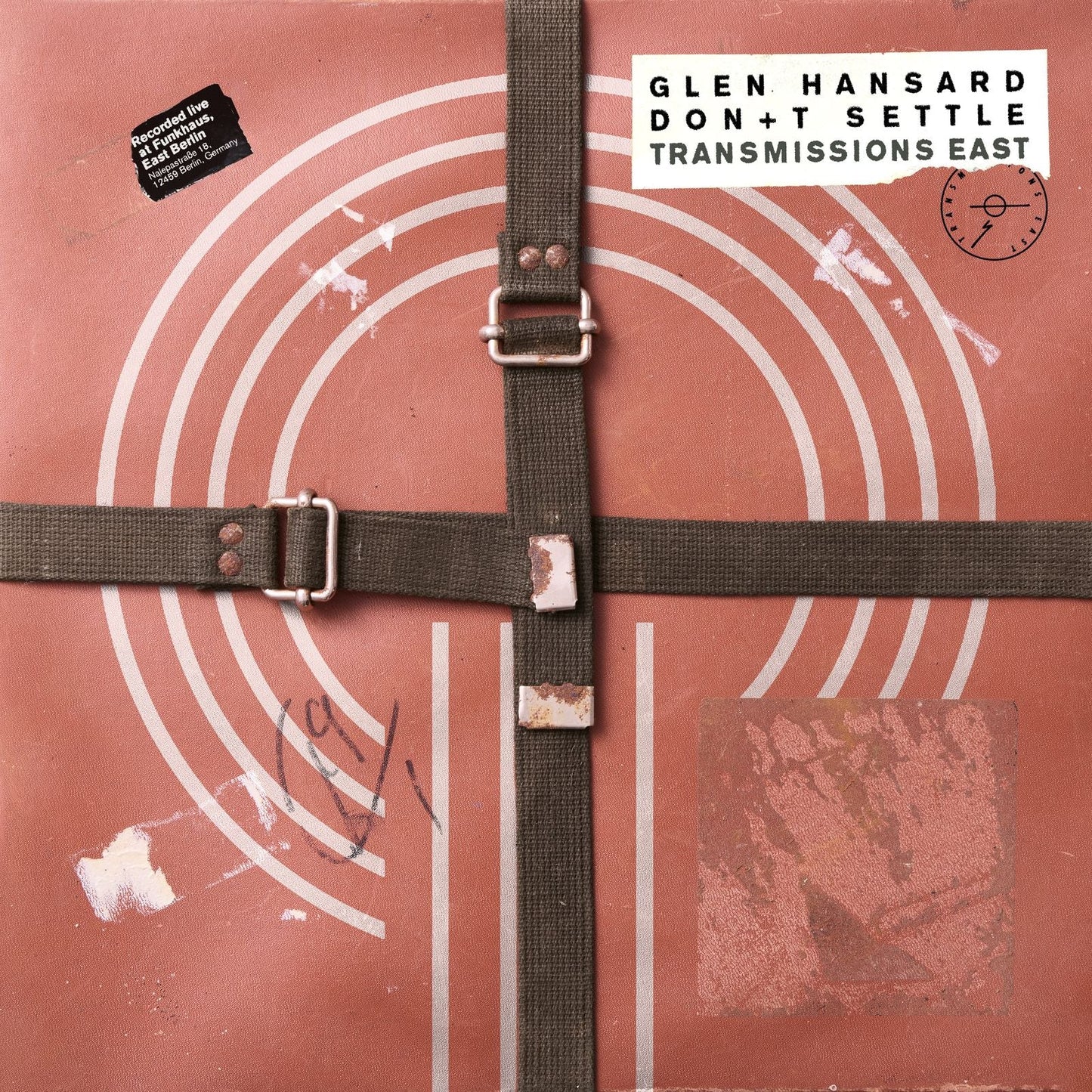 Glen Hansard album cover: textured beige with red concentric circles and buckle.