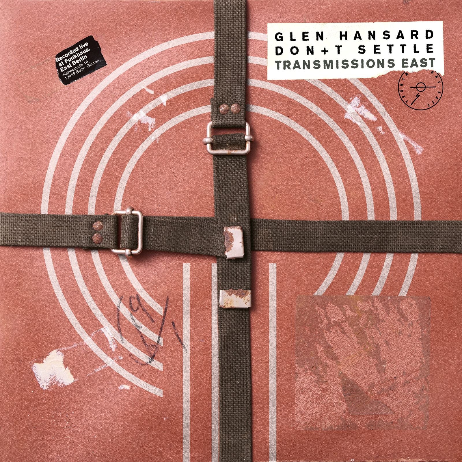 Glen Hansard album cover: textured beige with red concentric circles and buckle.