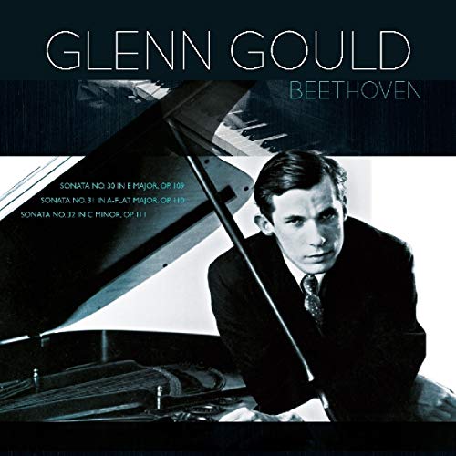 Vinyl album cover featuring Glenn Gould at a piano, with dark blue background.