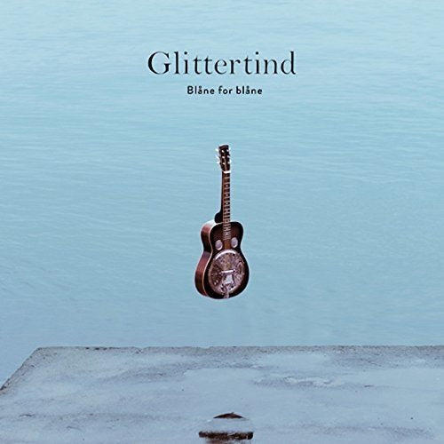 CD cover: acoustic guitar suspended over water, text "Glittertind".