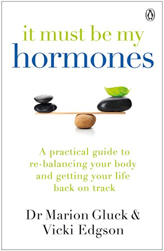 Book cover with stacked stones and a leaf, titled "It Must Be My Hormones.