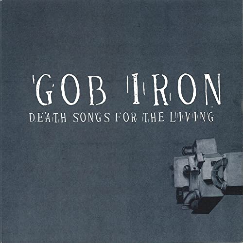 CD cover for Gob Iron’s “Death Songs For The Living” with a projector.